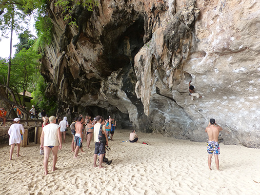 It was common to see beach goers watching climbers. This guy seemed to be a local and was very much performing for the crowd. 