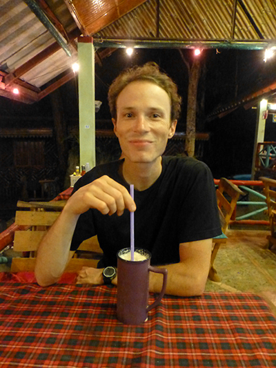 Me enjoying a fruit lassi (fruit and yogurt drink) at Rapala Restaurant.