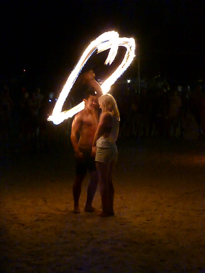 Awhhh, look at that. It's a heart. Every show they pull in a "volunteer" to twirl fire around their head. 