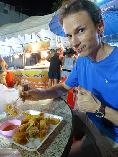 Dave trying the egg rolls.