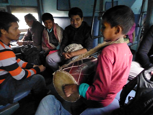 This young guy came through our train car to sing and drum in an effort to earn a little money. It worked. 