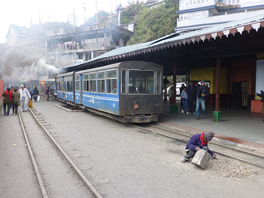 Someone sorting through the just removed ashes for unused coal.