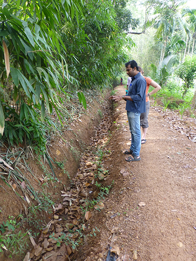Trenches next to the path to trap all the water that runs down the hill.