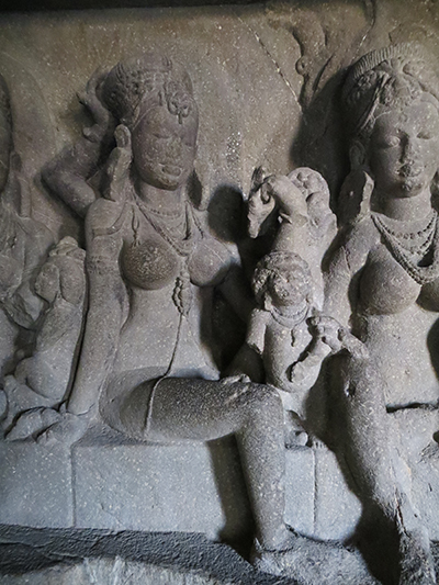 Many of the figures carved had very rigid postures. This one seemed the most natural. Also, you can see where most people touch the statues.