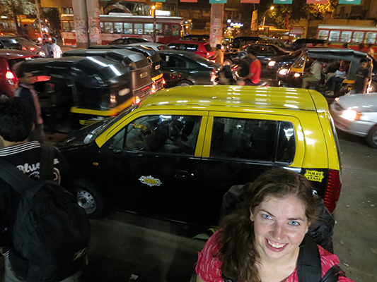 Waiting for our bus to arrive in all of this traffic.