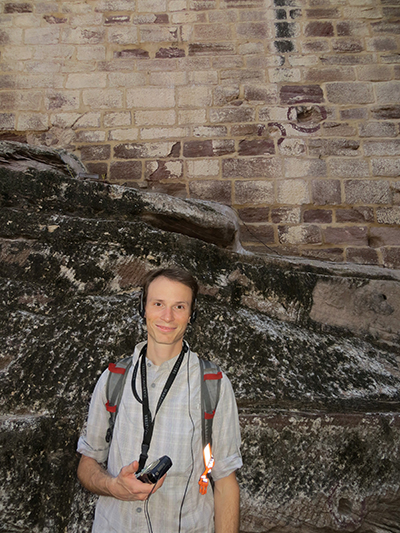 Enjoying the audio tour. Those circles behind me on the wall mark the spot where cannon balls hit during battle. The fort was never penetrated in its history.
