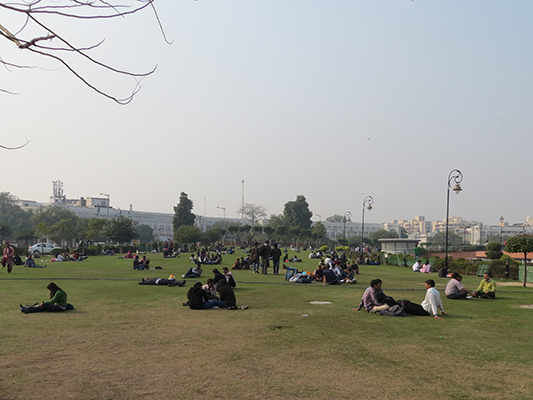 Lounging in the park. This is where all of the love birds hang out. Here is where we saw the most contact between the opposite sex. In this case they were all young, mid 20's or so. 
