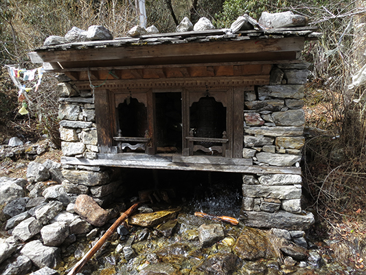 Water powered Buddhist prayer wheels. 