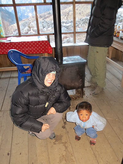 Sarah and the owner's son doing squats I think.