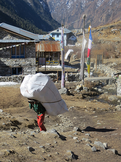 Another guy carrying a heavy load. I didn't happen to catch any woman porters but they were out there as well carrying heavy loads. 