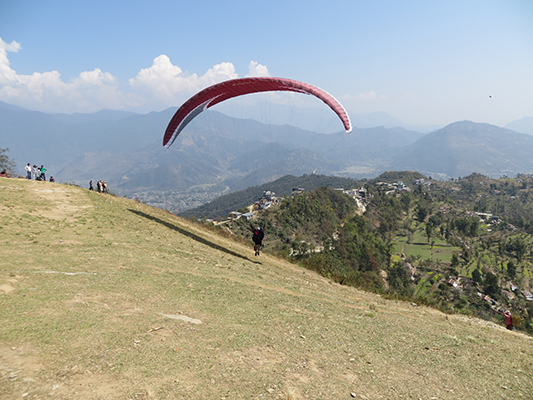 Walk/run until chute opens, pulls you back and then forward off the mountain