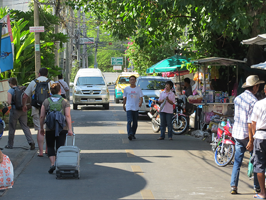 The lively little street outside of the White Lodge Hotel.