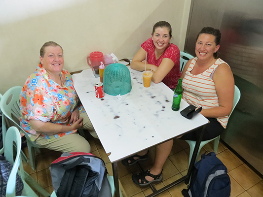 Karen, Sarah, and Jen waiting for their first meal in Thailand. Not actually Sarah's first meal there.